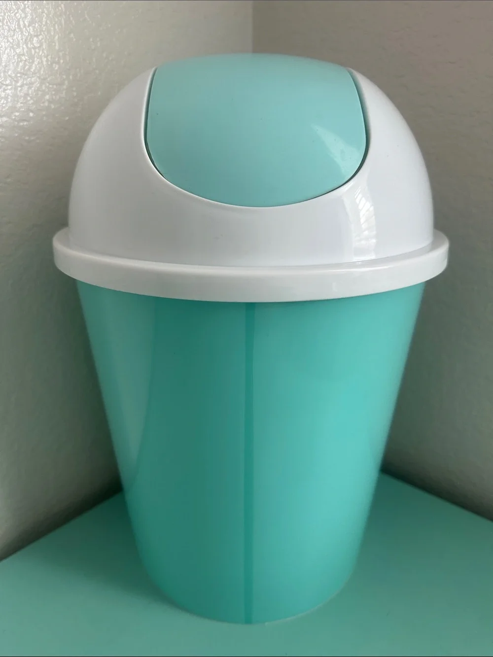 Essential Home Designs-basic plastic trash can with swinging top-new